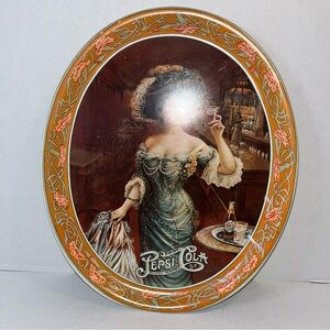 Vintage Pepsi Decorative Plate with Orange and Green Accents